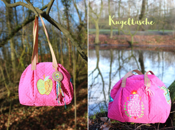 Farbenmix Kugeltasche aus pinkem Taschenstoff bestickt mit Schriftzug