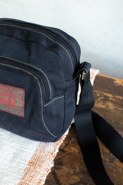 Bugwelle Adventskalendertasche aus schwarzem Canvas