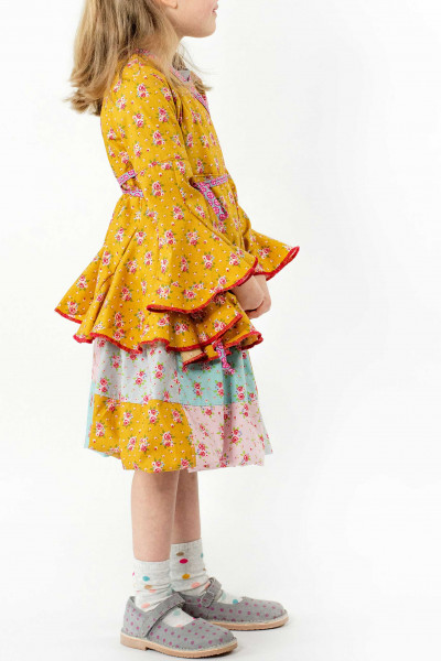 Schnittmuster Mädchen Volant-Wickelbluse "Hermosa" mit Trompetenärmeln