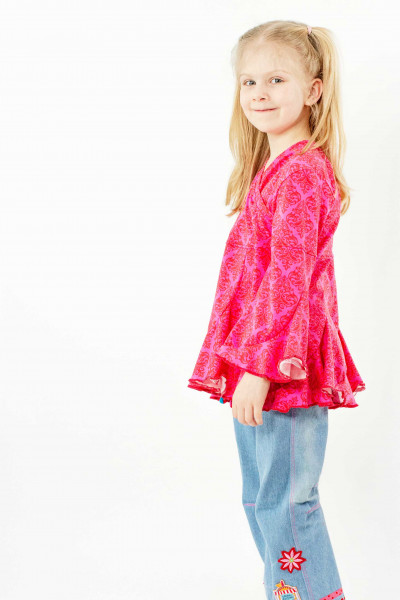 Schnittmuster Mädchen Volant-Wickelbluse "Hermosa" mit Trompetenärmeln